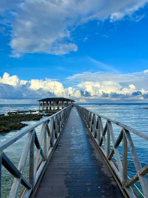 The Cloud 9 surf break boardwalk stretching over the sea in General Luna, Siargao, Philippines