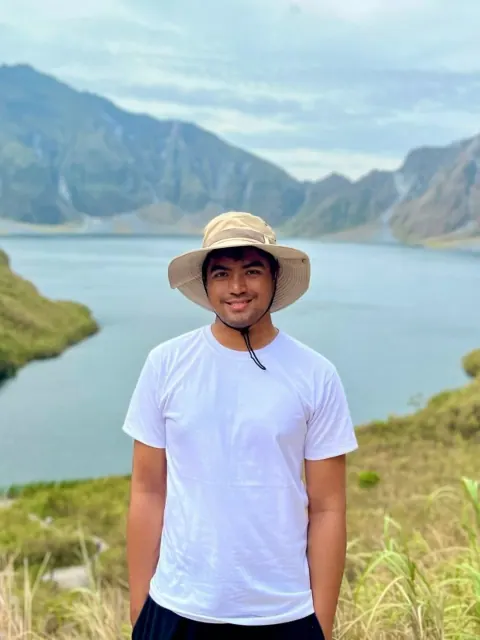 Merald standing above the Mount Pinatubo crater lake in the Philippines