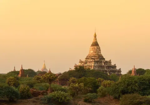 Ancient pagodas across the plain of Old Bagan at sunset, Myanmar